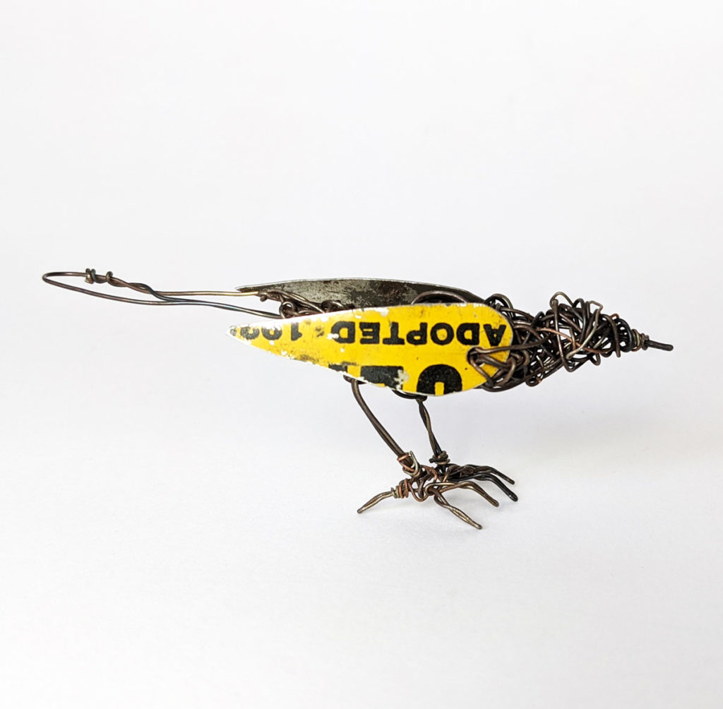 wire and tin bird sculpture