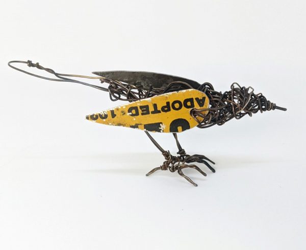 Bird sculpture made of tin and wire