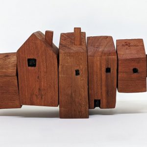 Carved red gum house sculpture